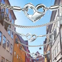 Pandora Bracelets Hanging From Colorful Buildings