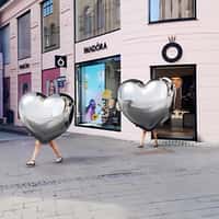 Pandora Heart Charms Walking Out of Store
