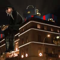 Ralph Lauren Giant Model Sitting on Rooftop