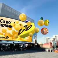 Yandex Go Logo and Balloons Coming Out of Screen