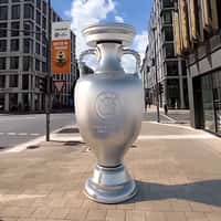 Trendyol Football Trophy Stands on the Sidewalk