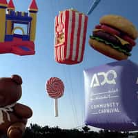 ADQ Community Giant Inflatables Floating at Park