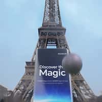 Honor Smartphone Leaning on Eiffel Tower