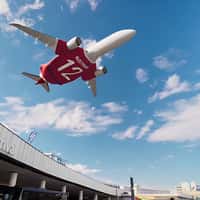 Austrian Airlines Plane Wearing a Red Jersey