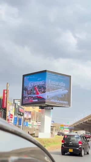 Can Weaves Through Colorful Balloons in a 3D Billboard ad of Red Bull