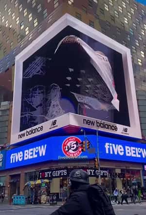 Sneakers Spin Into View in a 3D Billboard ad of New Balance