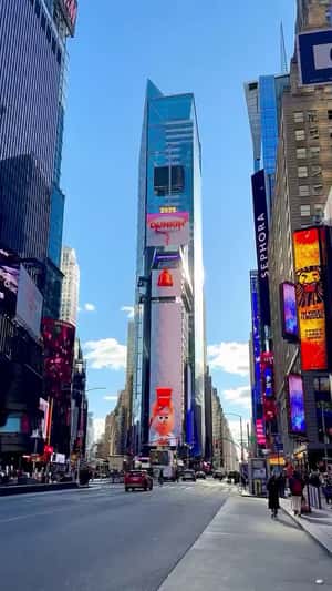 Munchkins Stack Up to Plug the Screen in a 3D Billboard ad of Dunkin