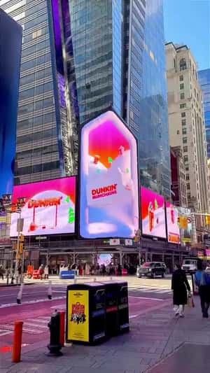 Munchkins Jump Out of the Box in a 3D Billboard ad of Dunkin
