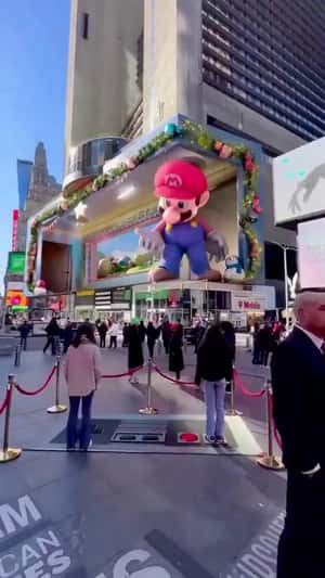 Mario Presents Console Beyond Screen in a 3D Billboard ad of Nintendo Switch