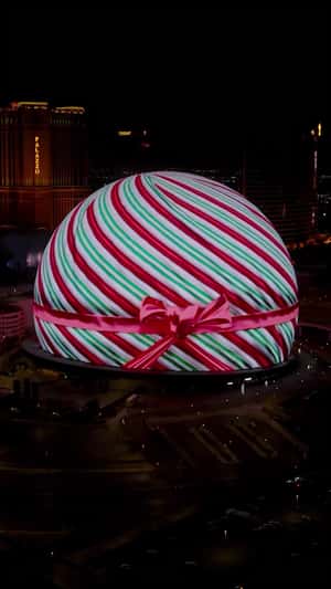 Sphere Christmas Ball Unwraps Holiday Layers in a 3D Billboard ad of Unknown
