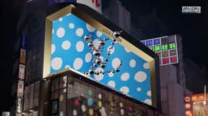 Suitcase Releases Sphere Magnets in a 3D Billboard Ad of Louis Vuitton