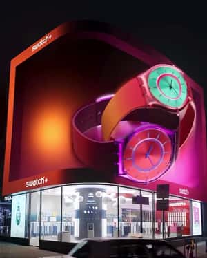 Wristwatches Move with Neon Light in a 3D Billboard Ad of BMW