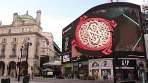 Giant Poker Chip Smashes Glass in a 3D Billboard ad of PokerStars 