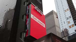 Message Waves From Corner to Corner in a 3D Billboard ad of Coca-Cola