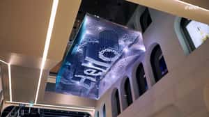 Korean Dancer Twirls in Flowing Hanbok in a 3D Billboard ad of Unknown