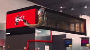 Girl With A Pearl Earring Reaches Out in a 3D Billboard ad of Coca-Cola