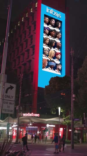VR User Peeks Beyond Billboard in a 3D Billboard ad of Infosys