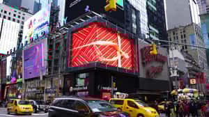 Sunglasses Hover into View in a 3D Billboard ad of Ray-Ban