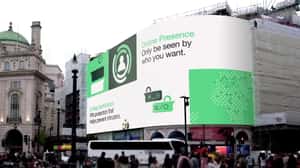 Vault Door Swings Out Beyond Billboard in a 3D Billboard ad of WhatsApp
