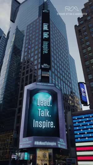 Hand Lifts Globe in a 3D Billboard ad of Richard Attias and Associates