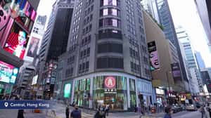 Hong Kong Disneyland Sorcerer Mickey Waves Wand in a 3D Billboard ad of Hongkong Disneyland