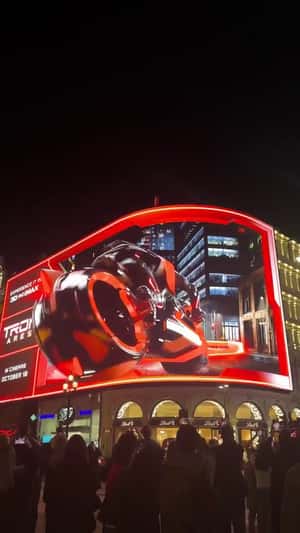 Light Cycle Sharp Turn Action in a 3D Billboard ad of Tron: Ares