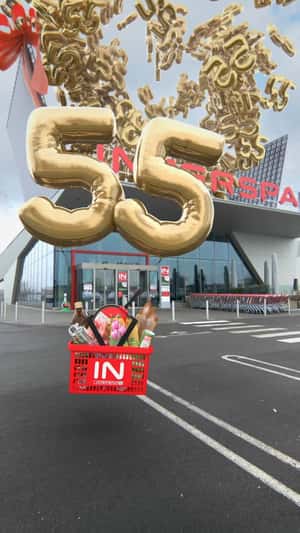 Roof Opens Releasing Golden 55 Balloons in a fake-out-of-home ad of Interspar