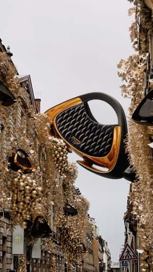 Bag Hangs in Between Buildings in a fake-out-of-home ad of Balmain