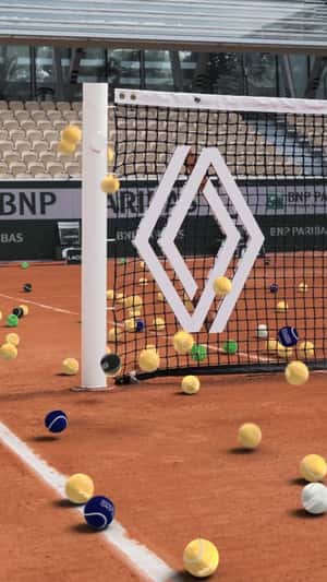 Tennis Balls Spill at Tennis Court in fake-out-of-home ad of Renault