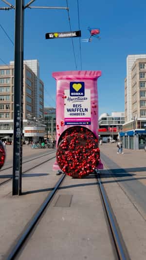 Rice Cakes Rolling at a Tramline in a fake-out-of-home ad of EDEKA