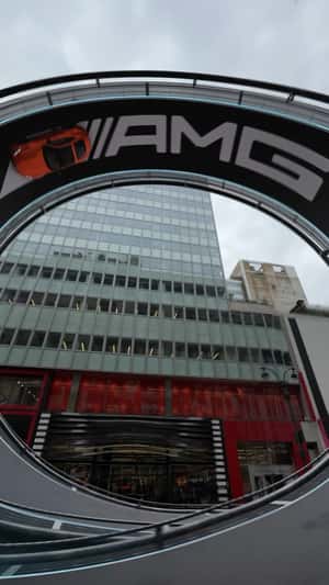 Mercedes-AMG GT 63 S E Loop-the-Loop in fake-out-of-home ad of Mercedes-Benz AMG