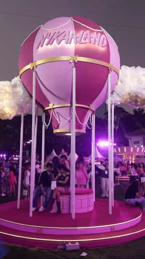 Parachutes and Floating Cosmetics in a fake-out-of-home ad of Nykaa