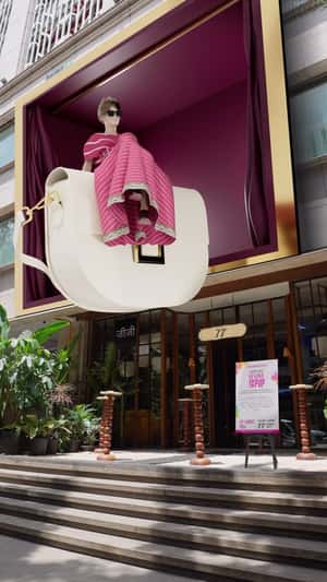 3D Window Display Opens at Café Façade in a fake-out-of-home ad of Nykaa