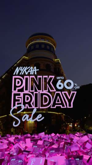 Pink Disco Ball Rolls Above the Building in a fake-out-of-home ad of Nykaa