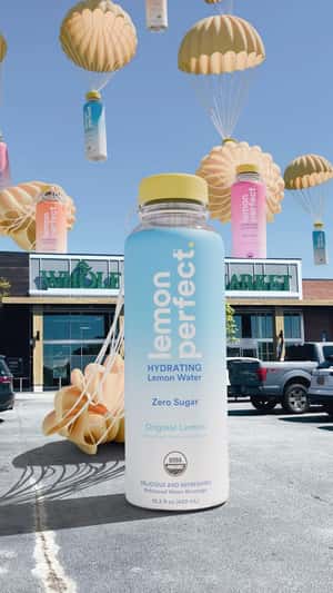 Bottles on Parachutes Descends in a fake-out-of-home ad of Lemon Perfect
