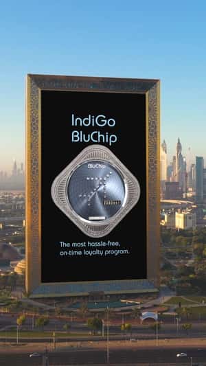 Poster Rolls Up at Dubai Landmark in a fake-out-of-home promotional ad of IndiGo
