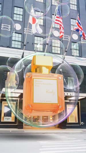 Perfume Bottle Riding Inside the Bubble in a fake-out-of-home ad of Bloomingdale’s