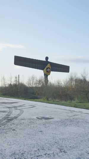 Duffle Bag on Worn by Statue in a fake-out-of-home ad of JD Sports
