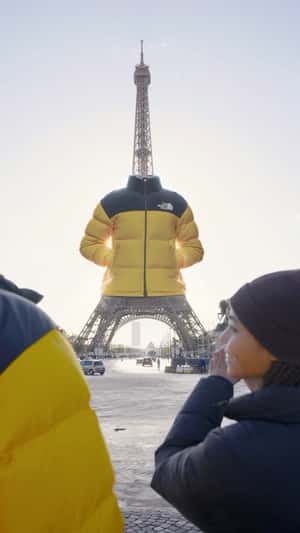 Eiffel Tower Dresses with Jacket in a fake-out-of-home ad of JD Sports