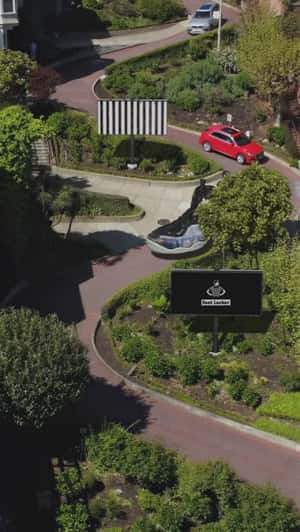 Shoe Cruising on Zigzag Road in a fake-out-of-home ad of Foot Locker