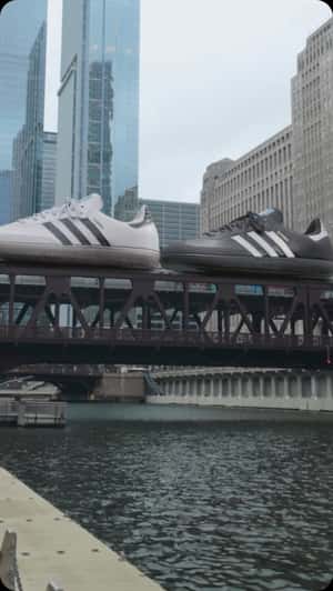 Sneakers Rides Above the Train in a fake-out-of-home ad of Foot Locker