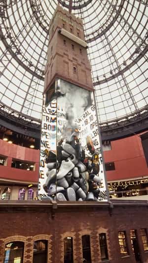 Tower Turned Shoes Claw Machine in a fake-out-of-home ad of Foot Locker