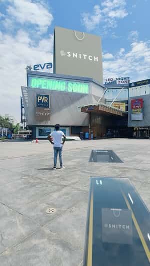 Shopping Bag Emerges Above the Mall in a fake-out-of-home ad of Snitch