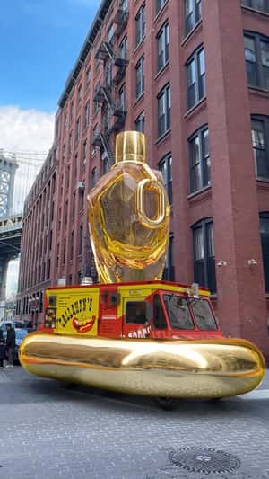 Food Truck Wrapped with Golden Chain Link in a fake-out-of-home of Rabanne