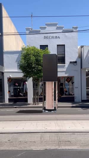 Liquid Eye Shadow Drops From the Sky in a fake-out-of-home-ad of DECJUBA