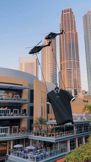 Helicopters Hangs Jersey at Dubai Mall in a fake-out-of-home ad of Amaya