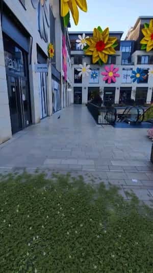 Flower Installations at Mall in a fake-out-of-home ad of Quoifaireabordeaux