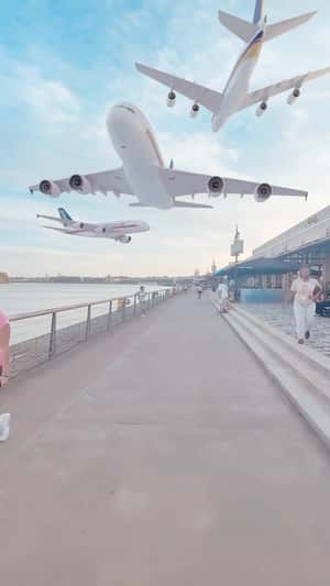Planes Fly Above the Promenade in a fake-out-of-home ad of Quoifaireabordeaux