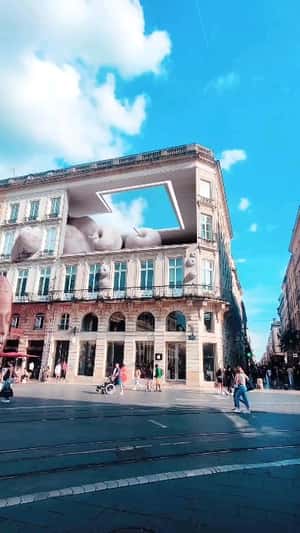 Apple Tree Grows at the Building in a fake-out-of-home ad of Quoifaireabordeaux