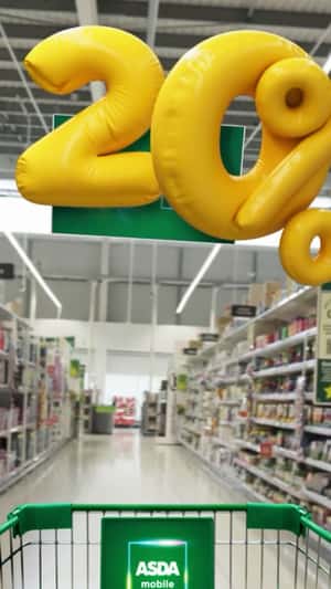Pushcart Bumps into Inflatables Number in a fake-out-of-home ad of ASDA Mobile